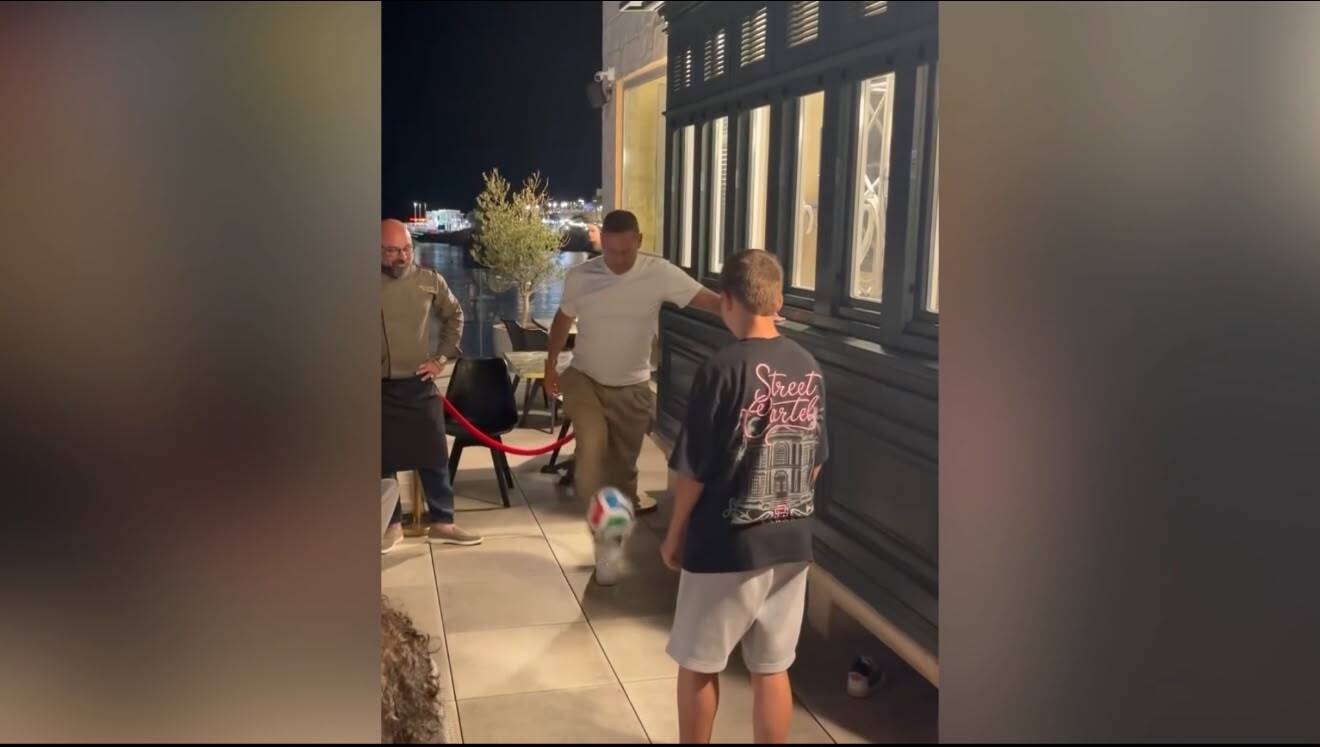 Totti takes part in keepy-uppy challenge with child at Malta restaurant