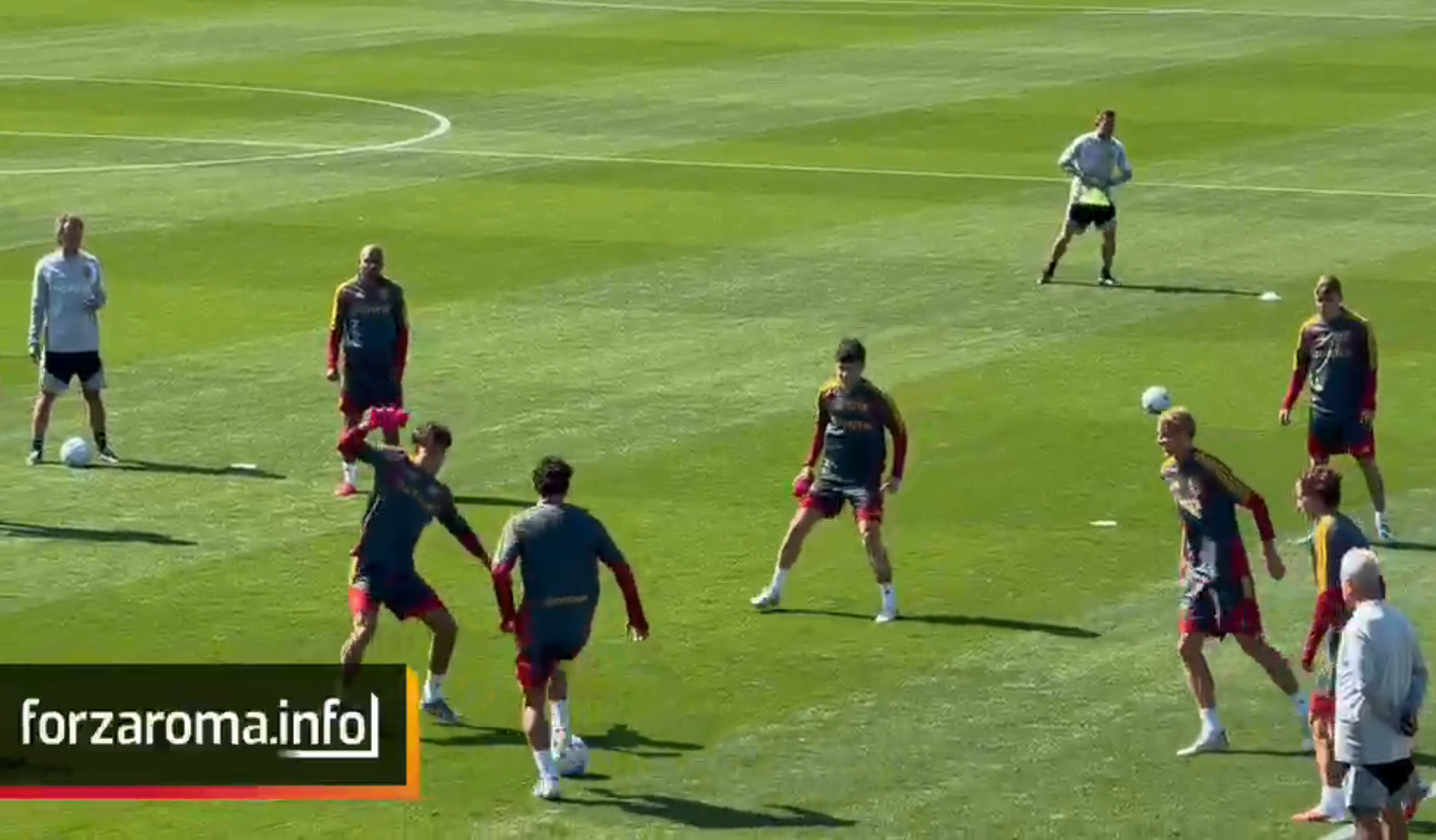 Roma train in Cardiff with possession drills and sprints; Malen works separately