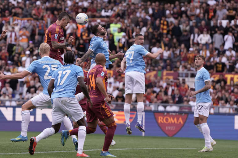 Mancini heads Roma to derby victory as aerial dominance breaks records