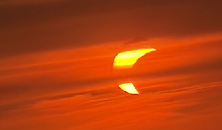 Solar eclipse captivates Roma fans with yellow and red sky display